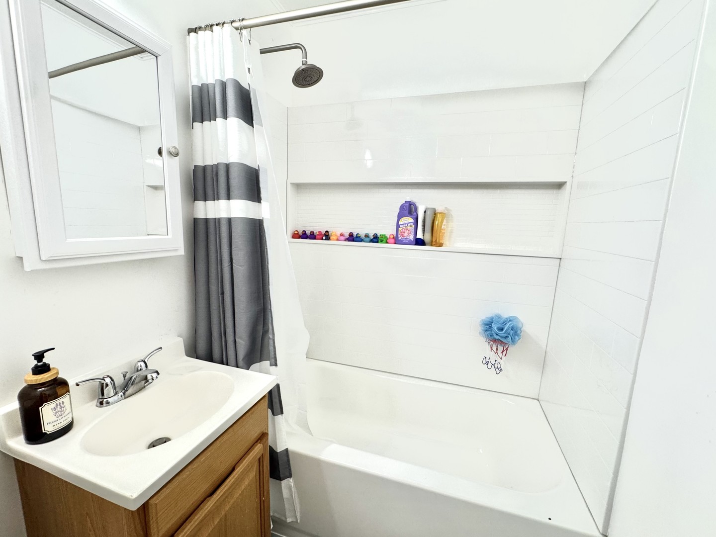 2109 Park Street Rolling Meadows, IL 60008 - Photo 16 of 19 a bathroom with a sink and a refrigerator