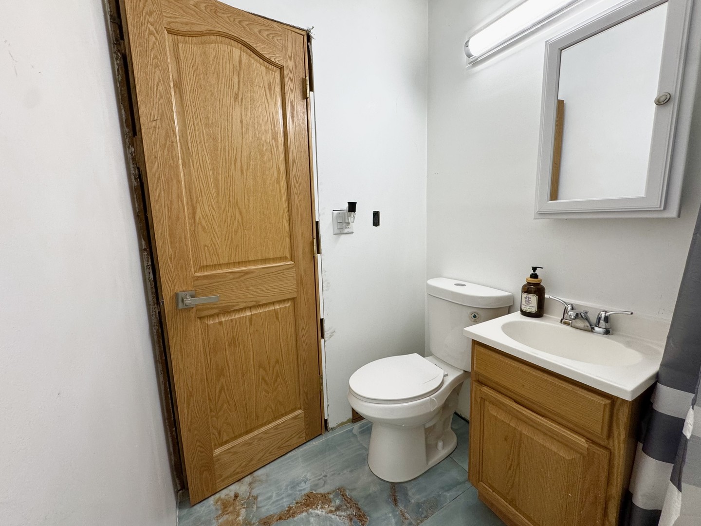 2109 Park Street Rolling Meadows, IL 60008 - Photo 9 of 19 a bathroom with a sink a toilet and vanity