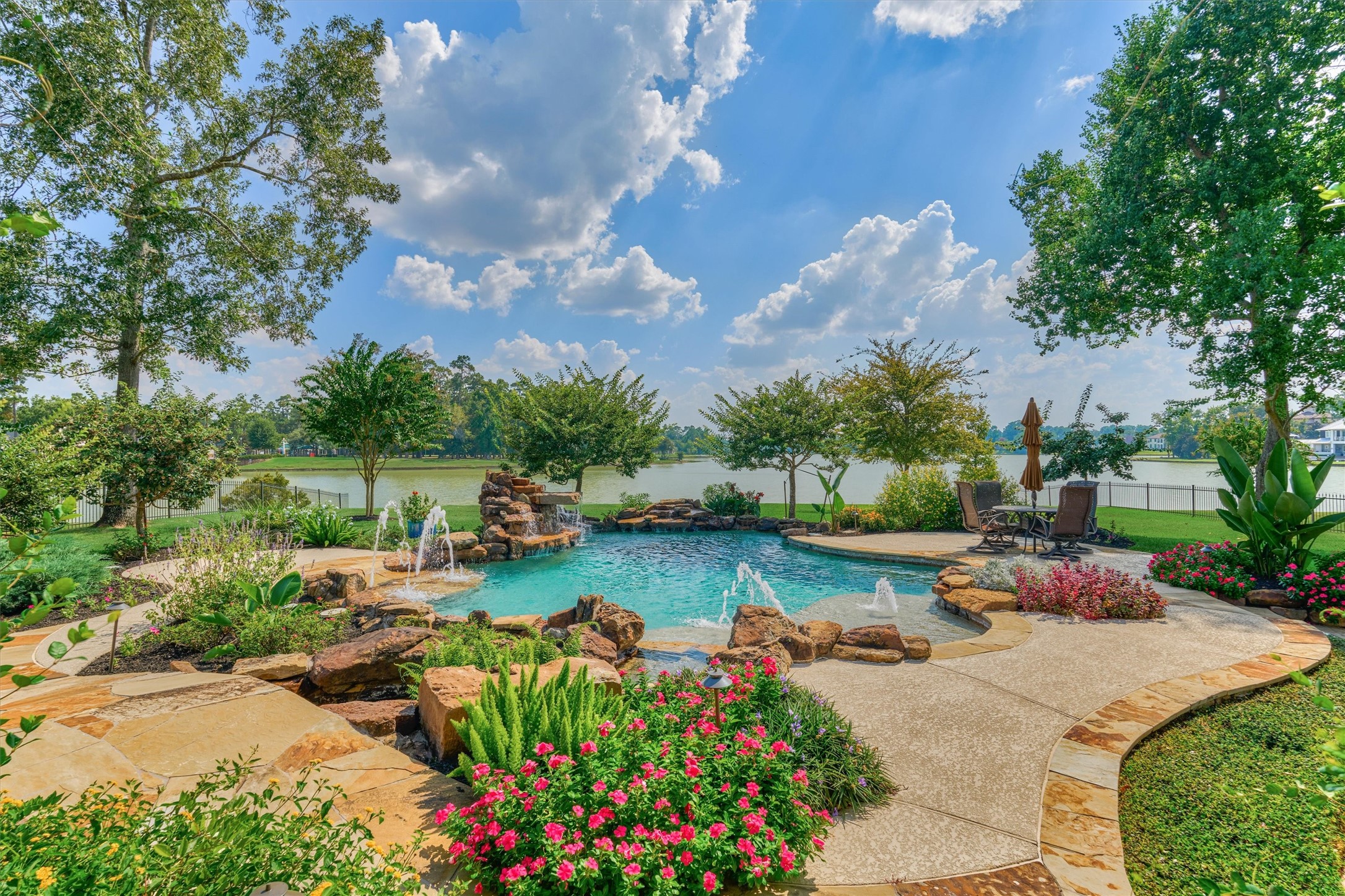 5402 White Birch Run Spring, TX 77386 - Photo 11 of 27 Enjoy the lake views while relaxing in the pool.