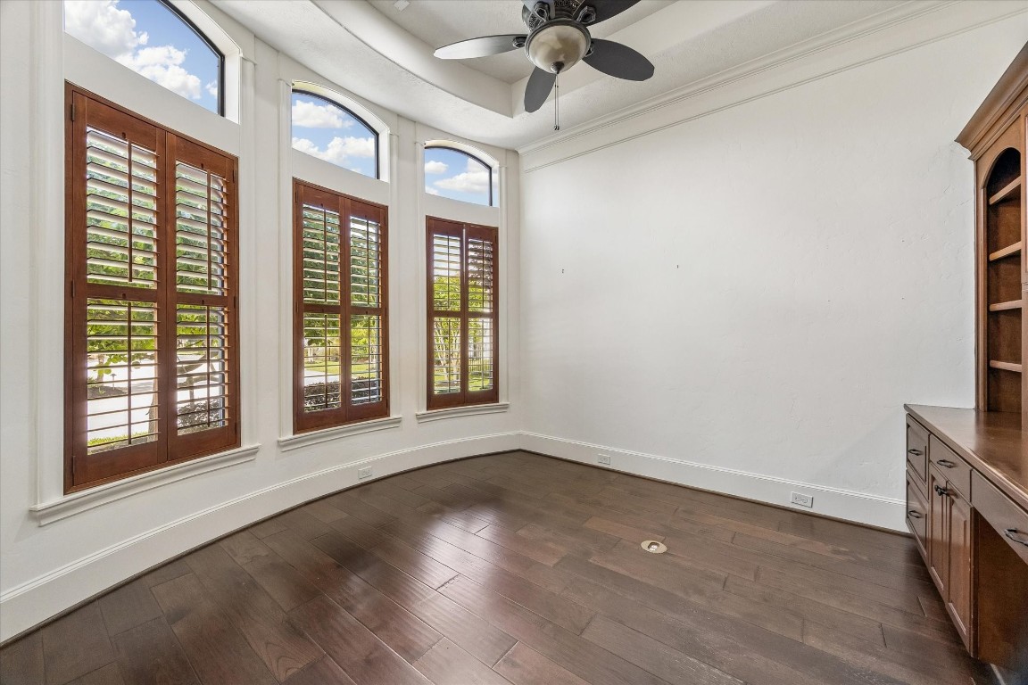 5402 White Birch Run Spring, TX 77386 - Photo 19 of 43 a view of an empty room with a window and wooden floor