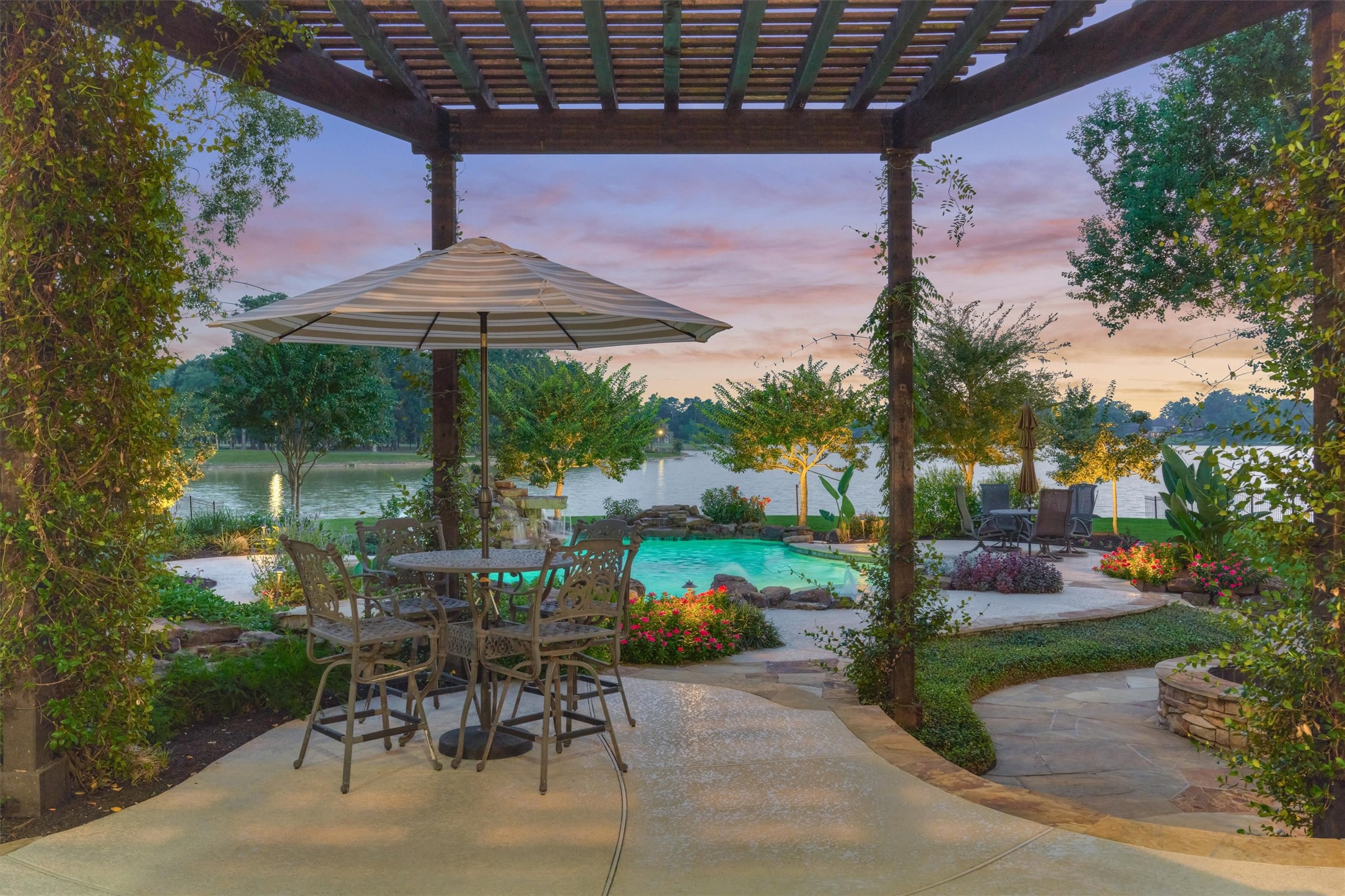 5402 White Birch Run Spring, TX 77386 - Photo 2 of 27 The lush outdoor living, dining loggia and private backyard oasis is exquisite.