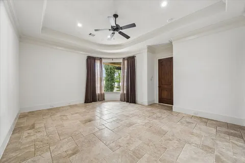 a large bathroom with a granite countertop tub sink shower and mirror