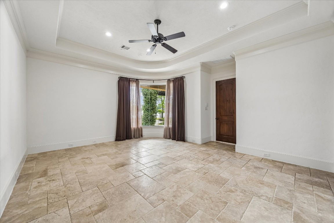 5402 White Birch Run Spring, TX 77386 - Photo 22 of 43 a view of an empty room with a ceiling fan