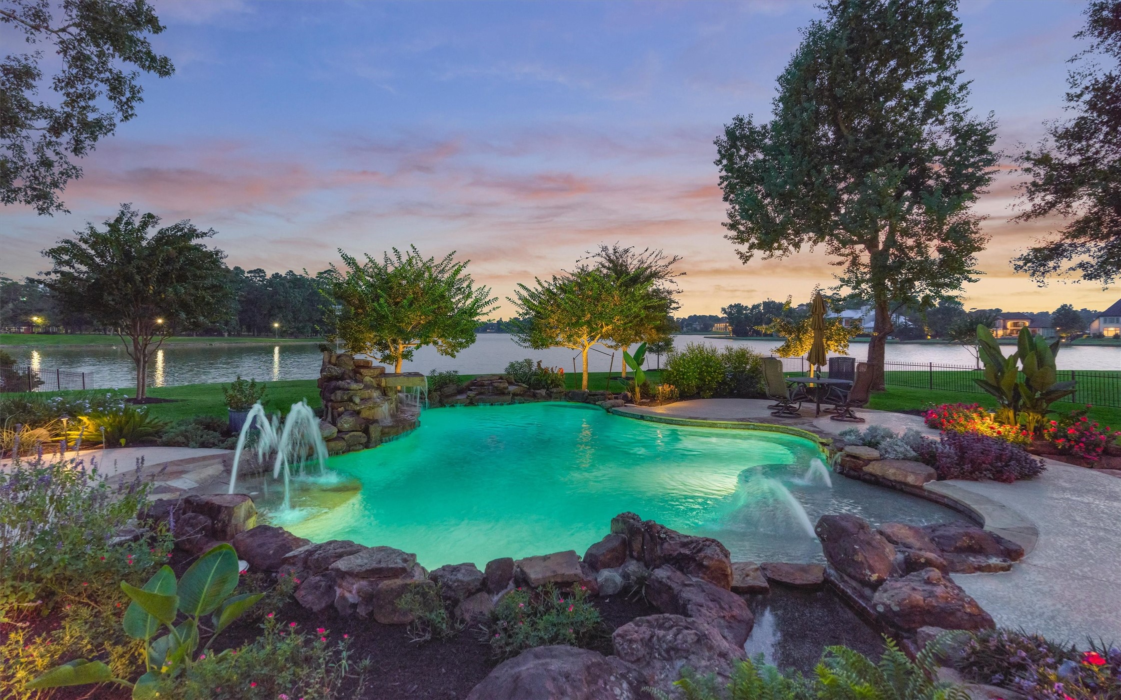 5402 White Birch Run Spring, TX 77386 - Photo 6 of 27 Resort-style pool surrounded by lush landscaping, offering a relaxing retreat.