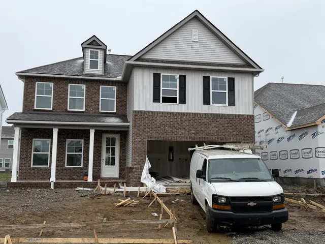 a car parked in front of a house