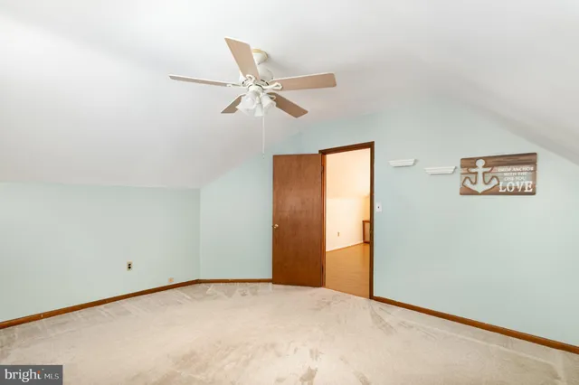 a view of a big room with carpet