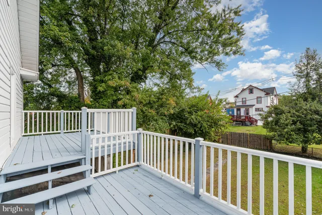 a view of a wooden roof deck