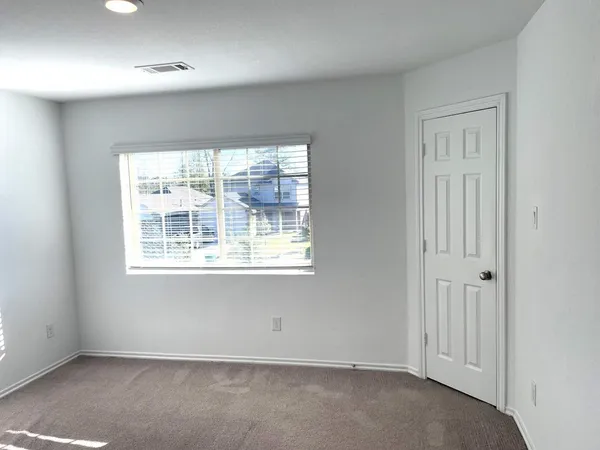 an empty room with a window
