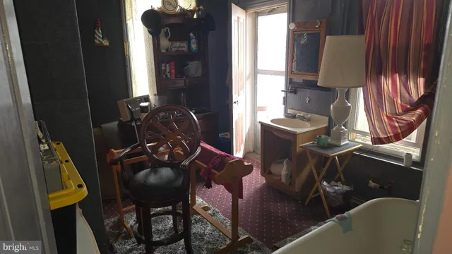 a room with furniture and wooden floor