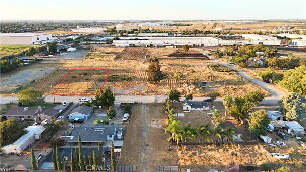 an aerial view of residential building and ocean