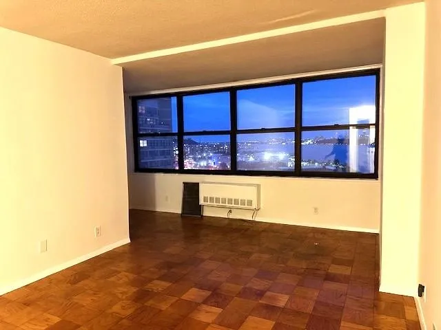 an aerial view of a house with a lake view