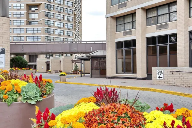 a view of a building with sitting area