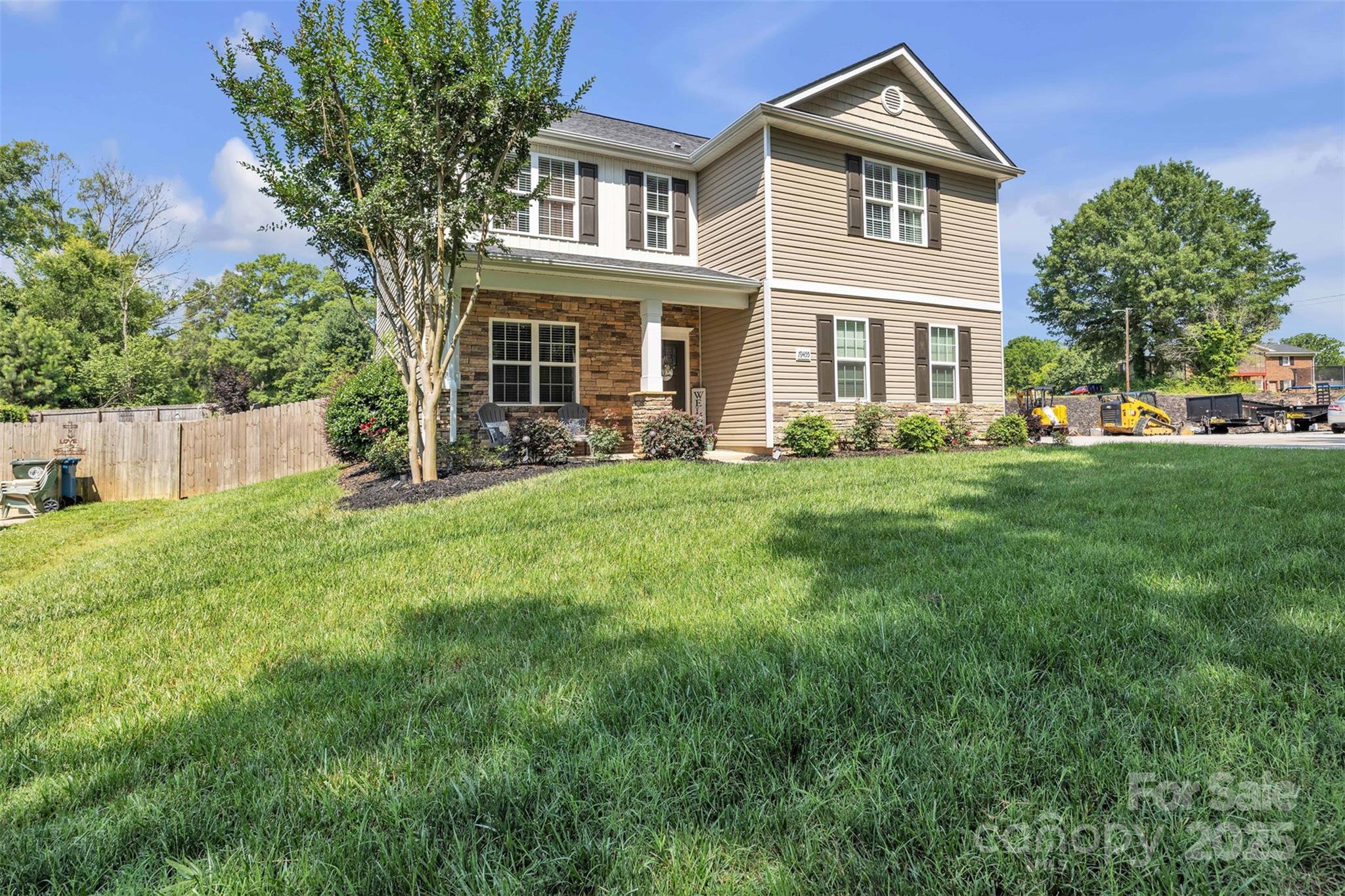 19455 Smith Circle Cornelius, NC 28031 - Photo 1 of 24 a front view of a house with a yard