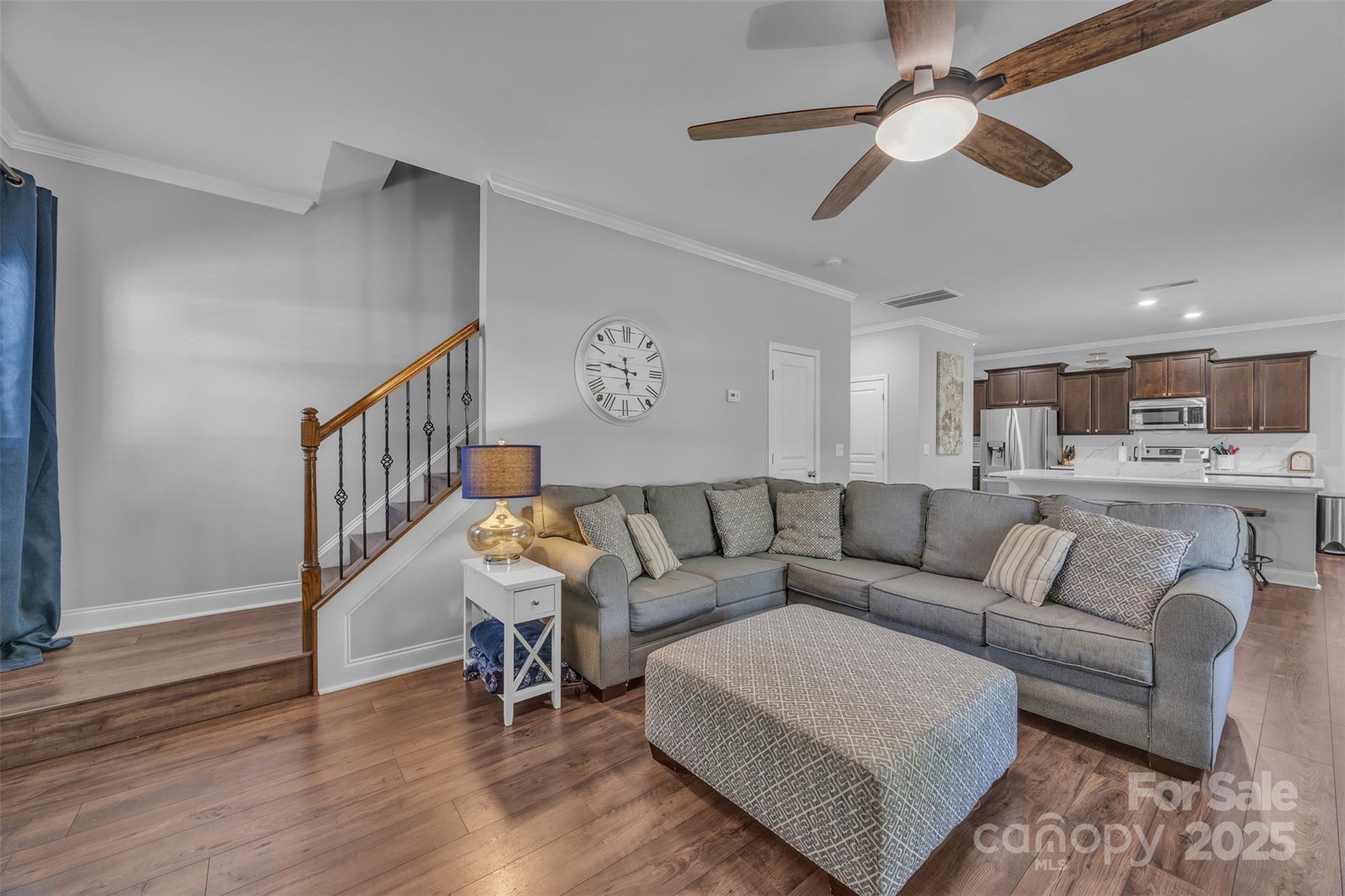 19455 Smith Circle Cornelius, NC 28031 - Photo 12 of 24 a living room with furniture and a wooden floor