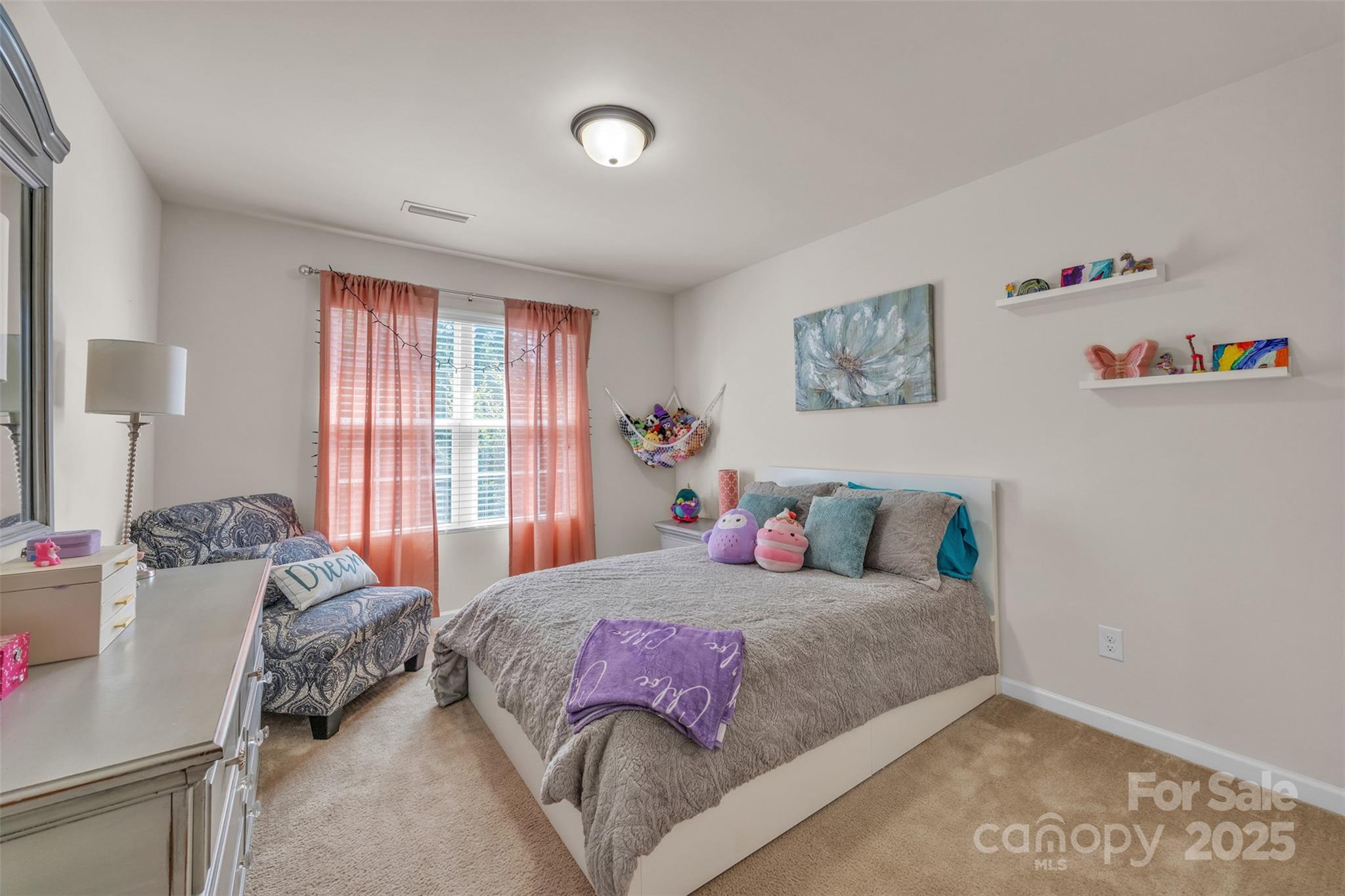 19455 Smith Circle Cornelius, NC 28031 - Photo 15 of 24 a bedroom with a bed and a window