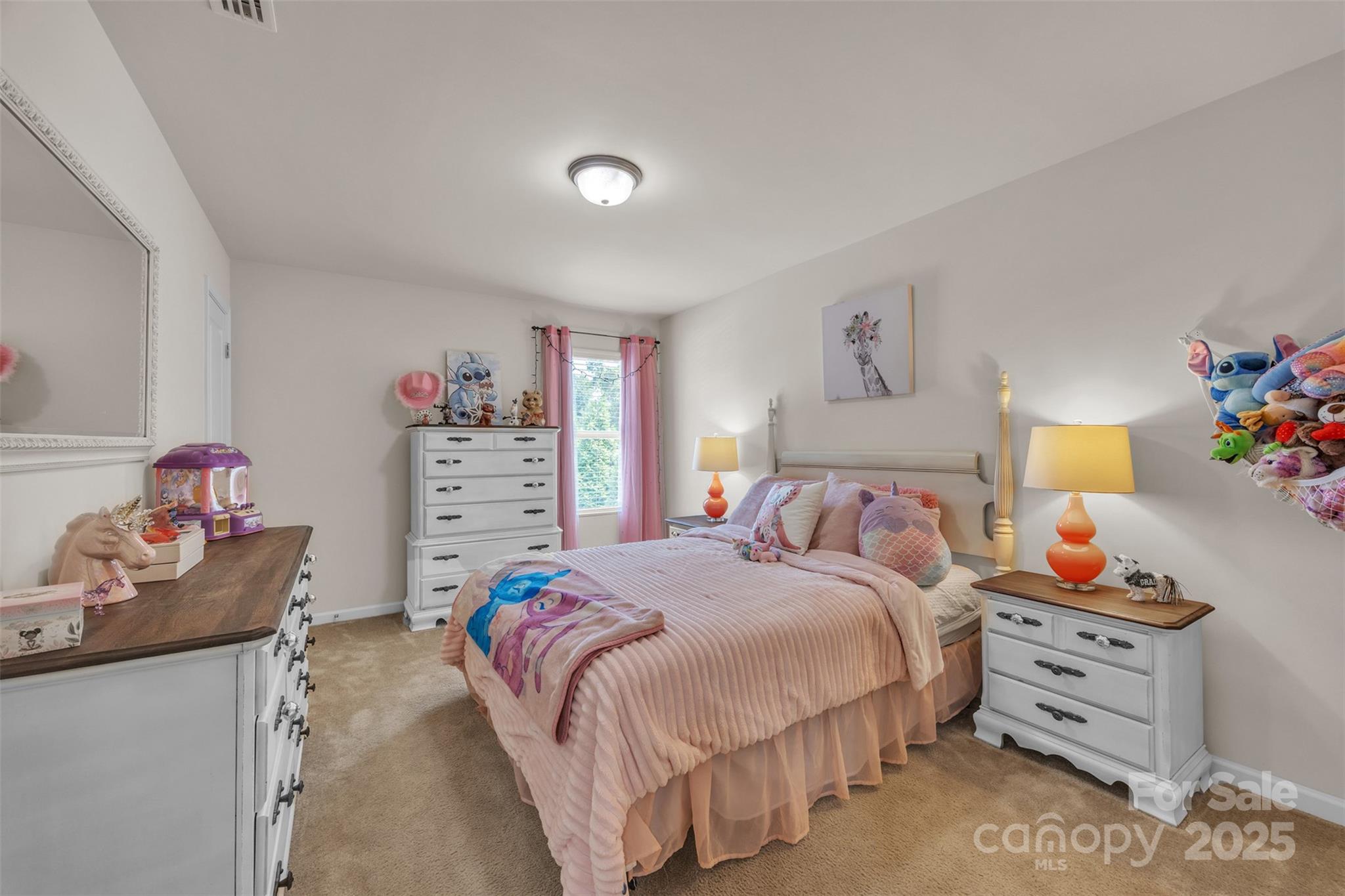 19455 Smith Circle Cornelius, NC 28031 - Photo 17 of 24 a bedroom with a bed and dresser