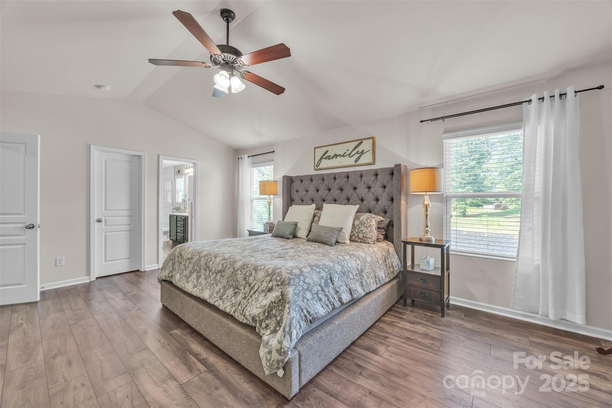 19455 Smith Circle Cornelius, NC 28031 - Photo 18 of 24 a bedroom with a bed and window