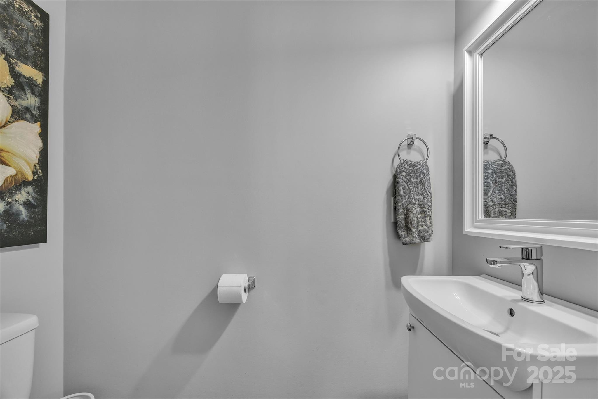 19455 Smith Circle Cornelius, NC 28031 - Photo 21 of 24 a bathroom with a sink and a mirror