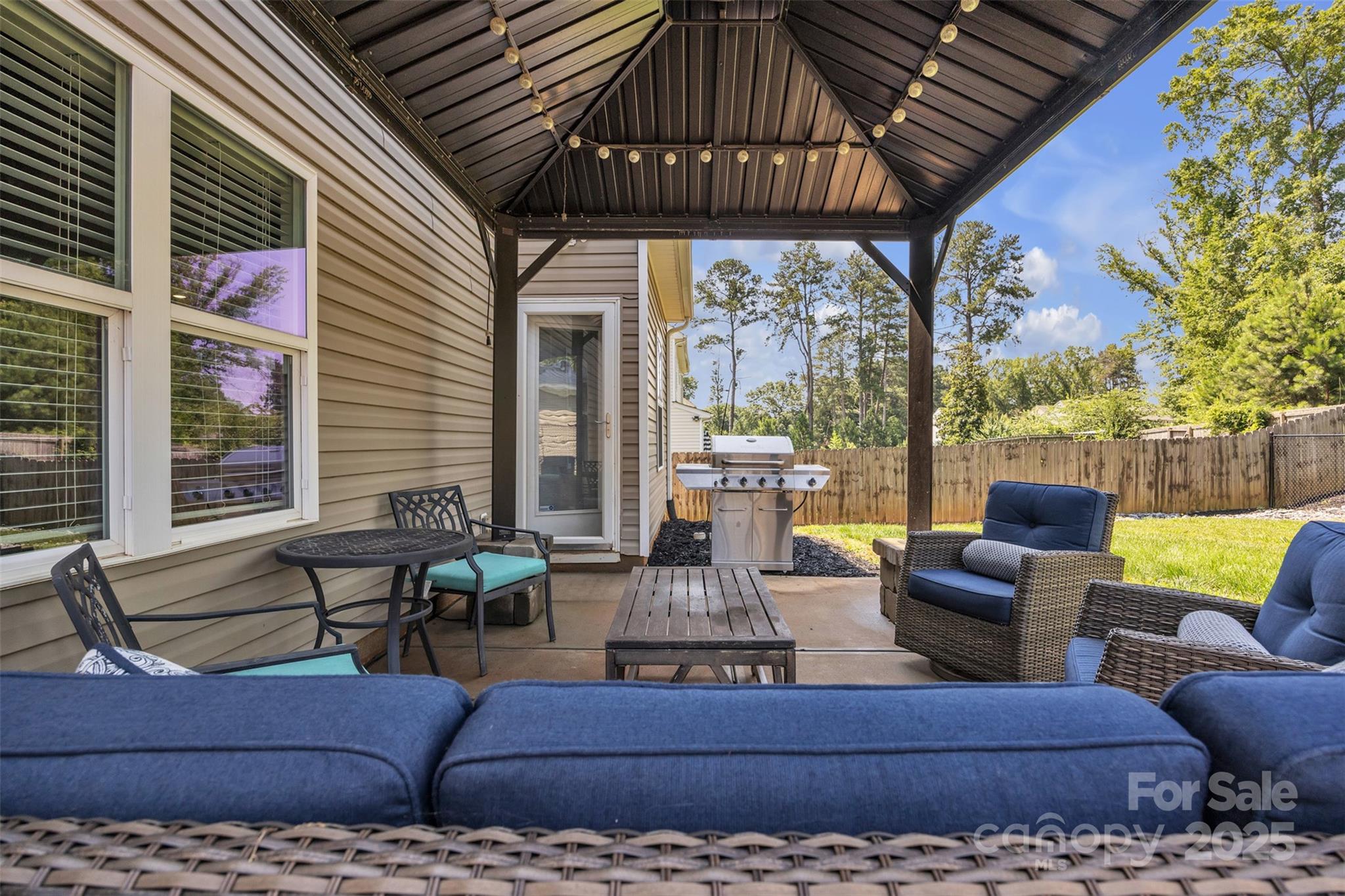 19455 Smith Circle Cornelius, NC 28031 - Photo 22 of 24 a living room with furniture and a large window