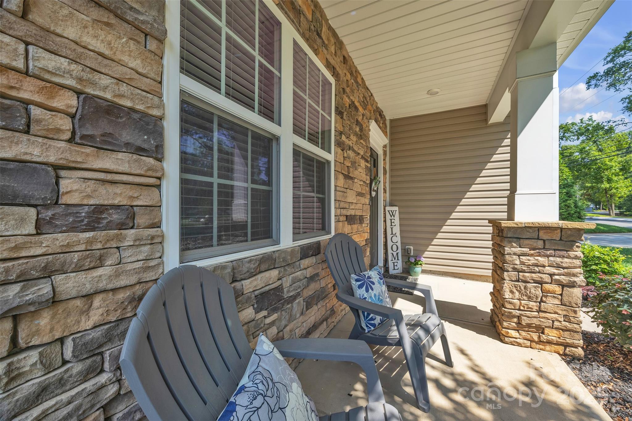 19455 Smith Circle Cornelius, NC 28031 - Photo 3 of 24 a view of balcony with wooden floor and seating space