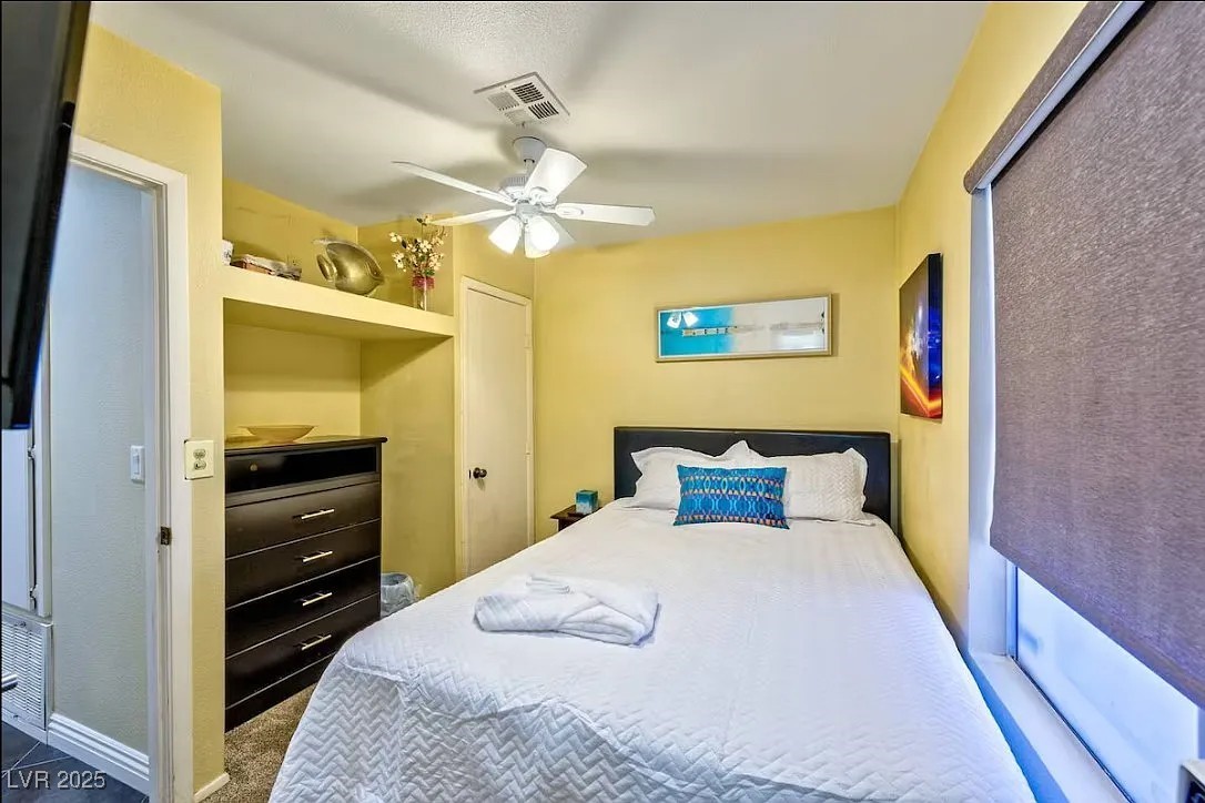 4823 Illustrious Street Las Vegas, NV 89147 - Photo 22 of 34 Bedroom with ceiling fan