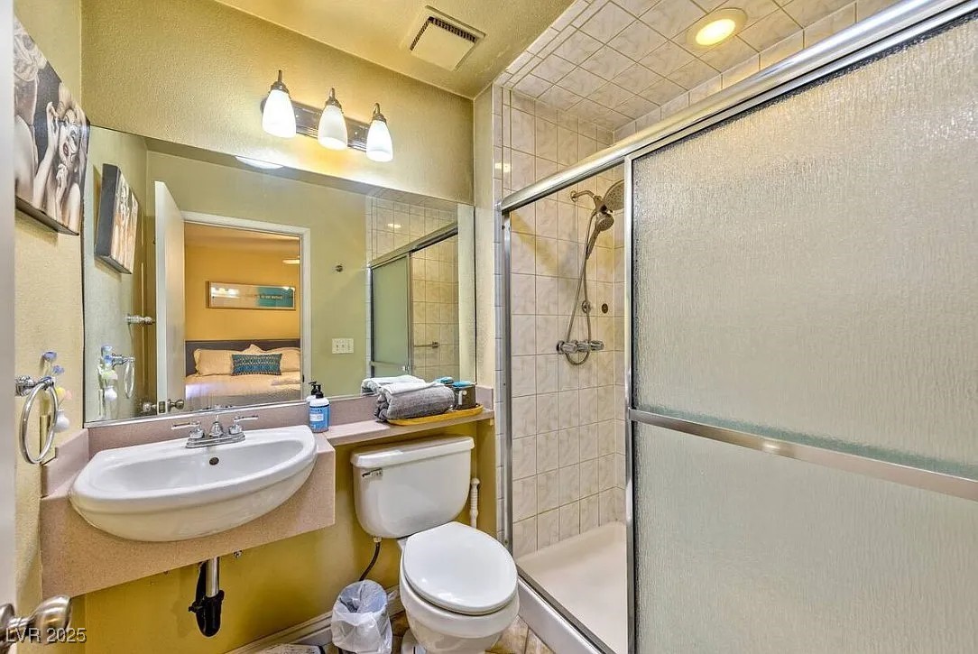 4823 Illustrious Street Las Vegas, NV 89147 - Photo 26 of 34 Ensuite bathroom with a shower stall