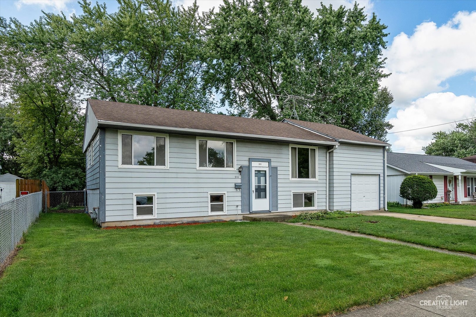 910 Southbridge Drive Aurora, IL 60506 - Photo 2 of 24 a front view of house with yard and green space