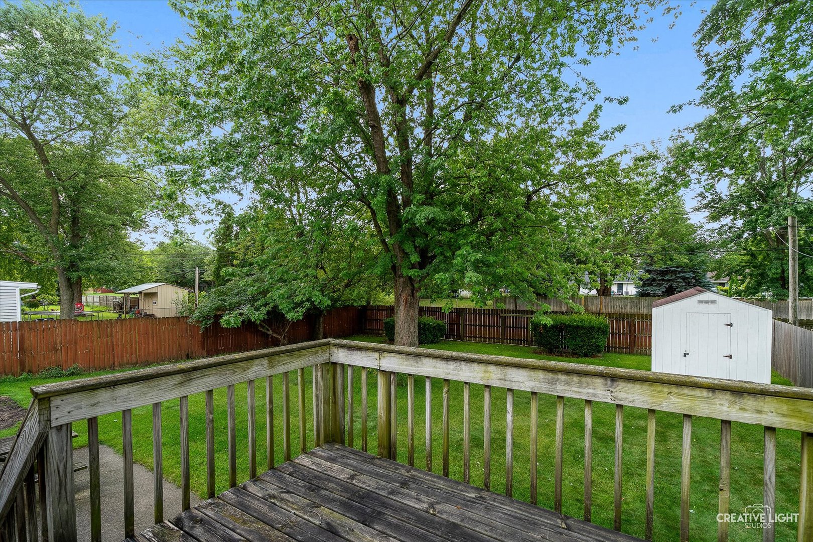 910 Southbridge Drive Aurora, IL 60506 - Photo 4 of 24 a view of a wooden deck