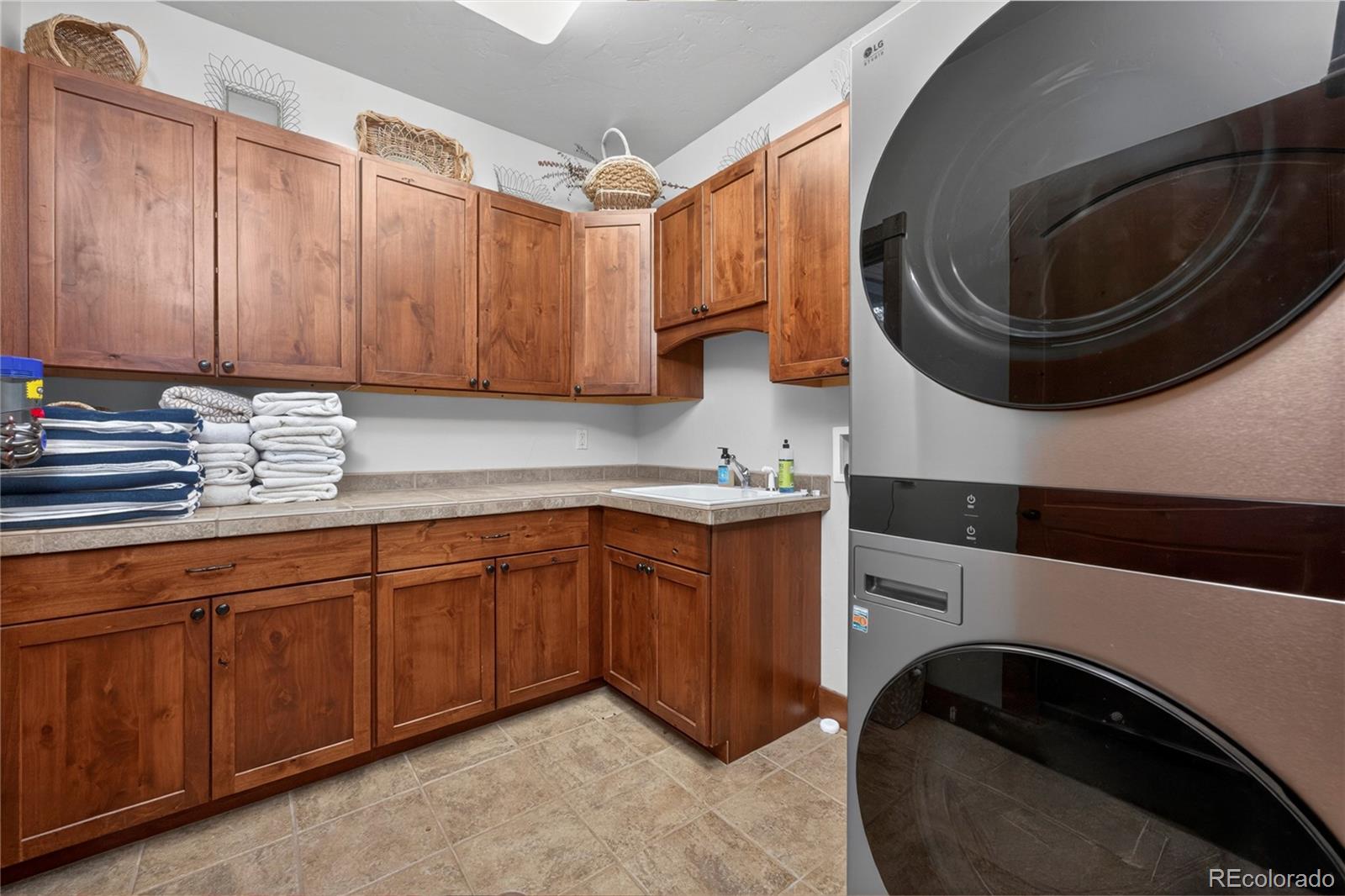 148 County Road Tabernash, CO 80478 - Photo 26 of 45 a kitchen with a sink and a stove