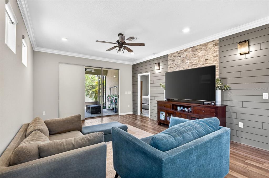 6427 Mooring Line Circle Apollo Beach, FL 33572 - Photo 4 of 34 a living room with furniture and a flat screen tv