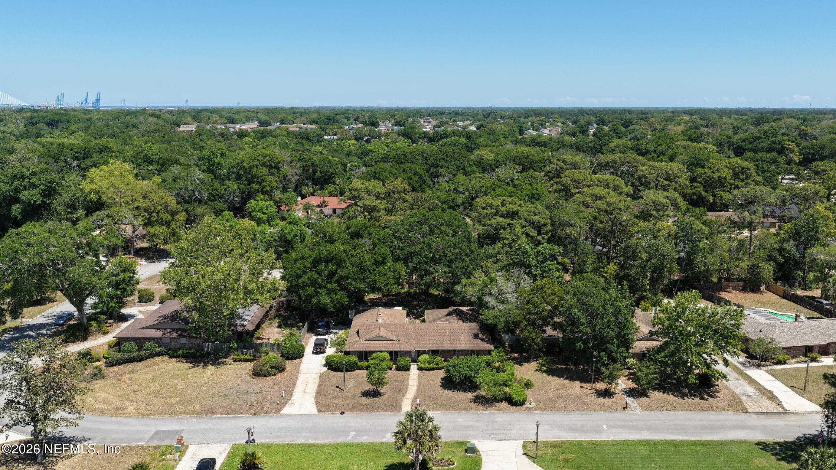 3371 Debussy Road Jacksonville, FL 32277 - Photo 4 of 21 DJI_20260423141410_0043_D