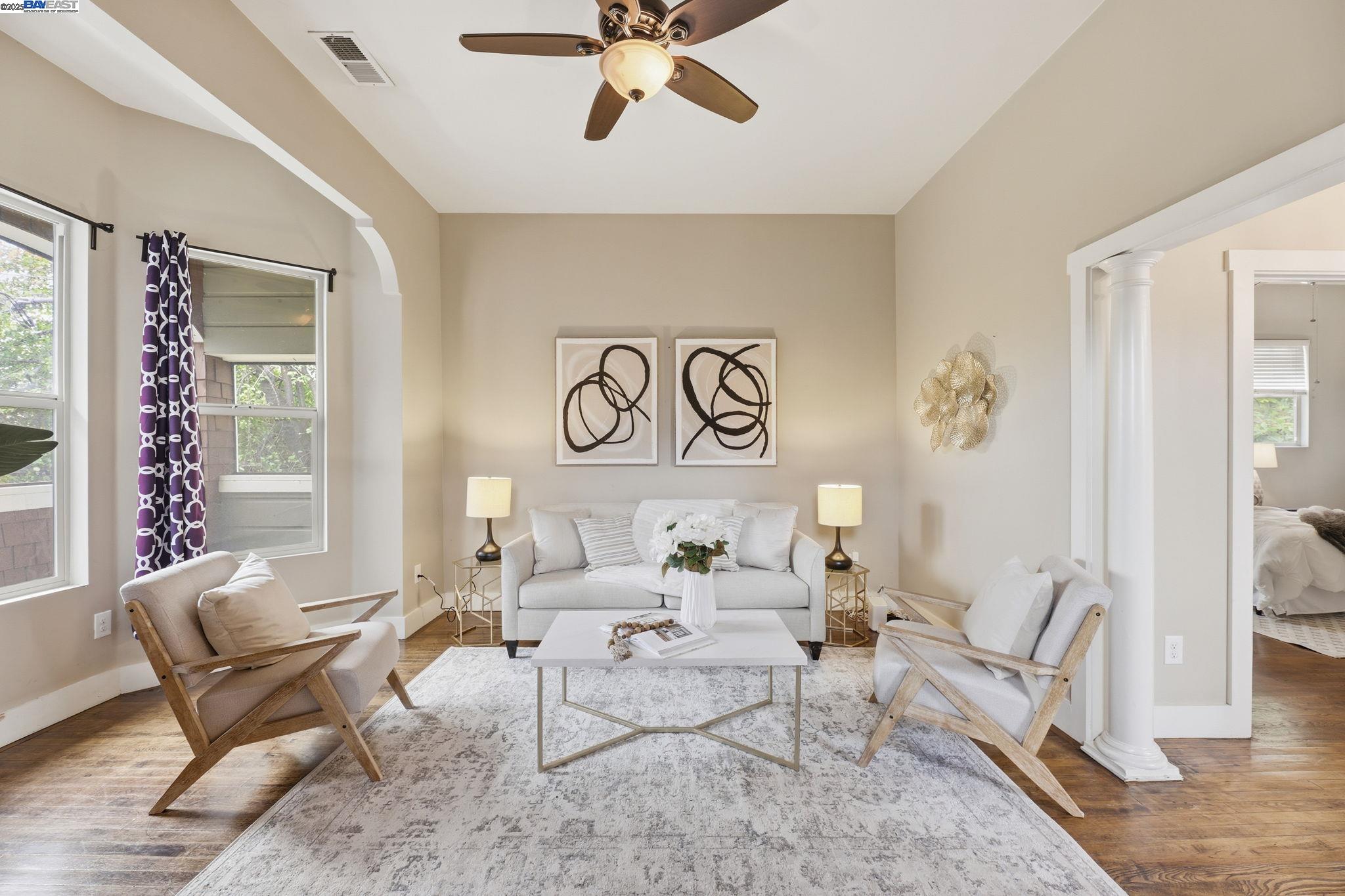 2417 Linden Street Oakland, CA 94607 - Photo 7 of 41 a living room with furniture and a window