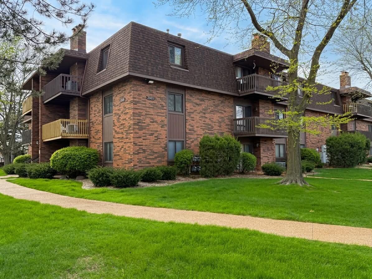 2003 West 45th Street, Unit 207 Highland, IN 46322 - Photo 1 of 13 a view of a house with a yard
