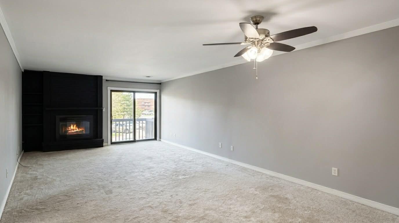 2003 West 45th Street, Unit 207 Highland, IN 46322 - Photo 2 of 13 an empty room with windows and fireplace