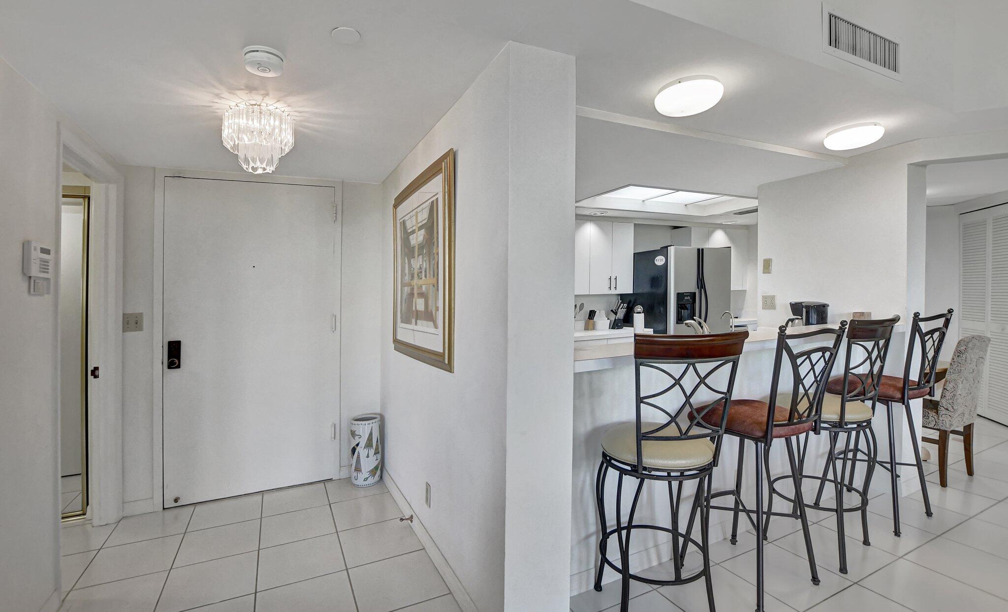 100 Southeast 5th Avenue, Unit 504 Boca Raton, FL 33432 - Photo 18 of 53 Entrance/bar stools