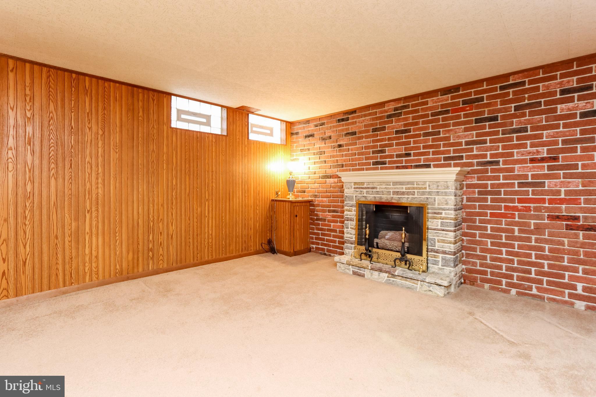 1631 Hardwick Road Baltimore, MD 21286 - Photo 17 of 46 Lower Level Family Room with gas fireplace.