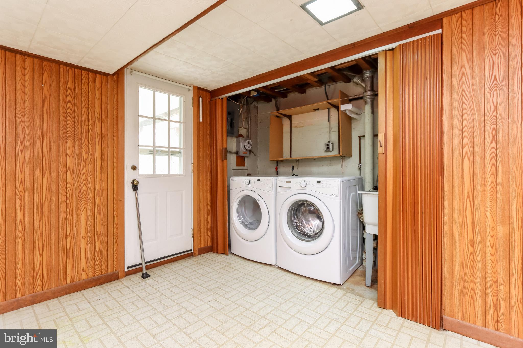 1631 Hardwick Road Baltimore, MD 21286 - Photo 23 of 46 Front load washer and dryer. Walk-out to patio.