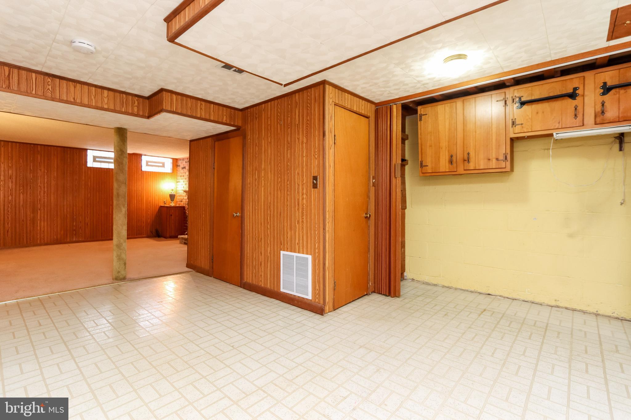 1631 Hardwick Road Baltimore, MD 21286 - Photo 24 of 46 Workshop area with wall cabinets.