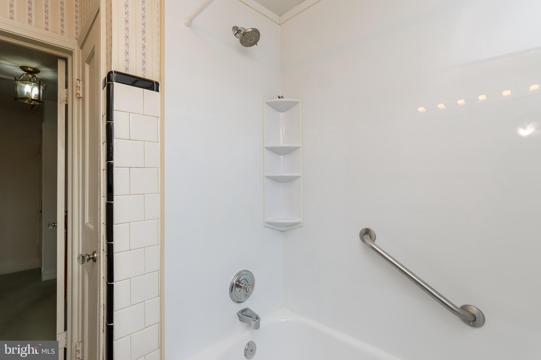 1631 Hardwick Road Baltimore, MD 21286 - Photo 35 of 46 Pristine ceramic tile flooring & surround.