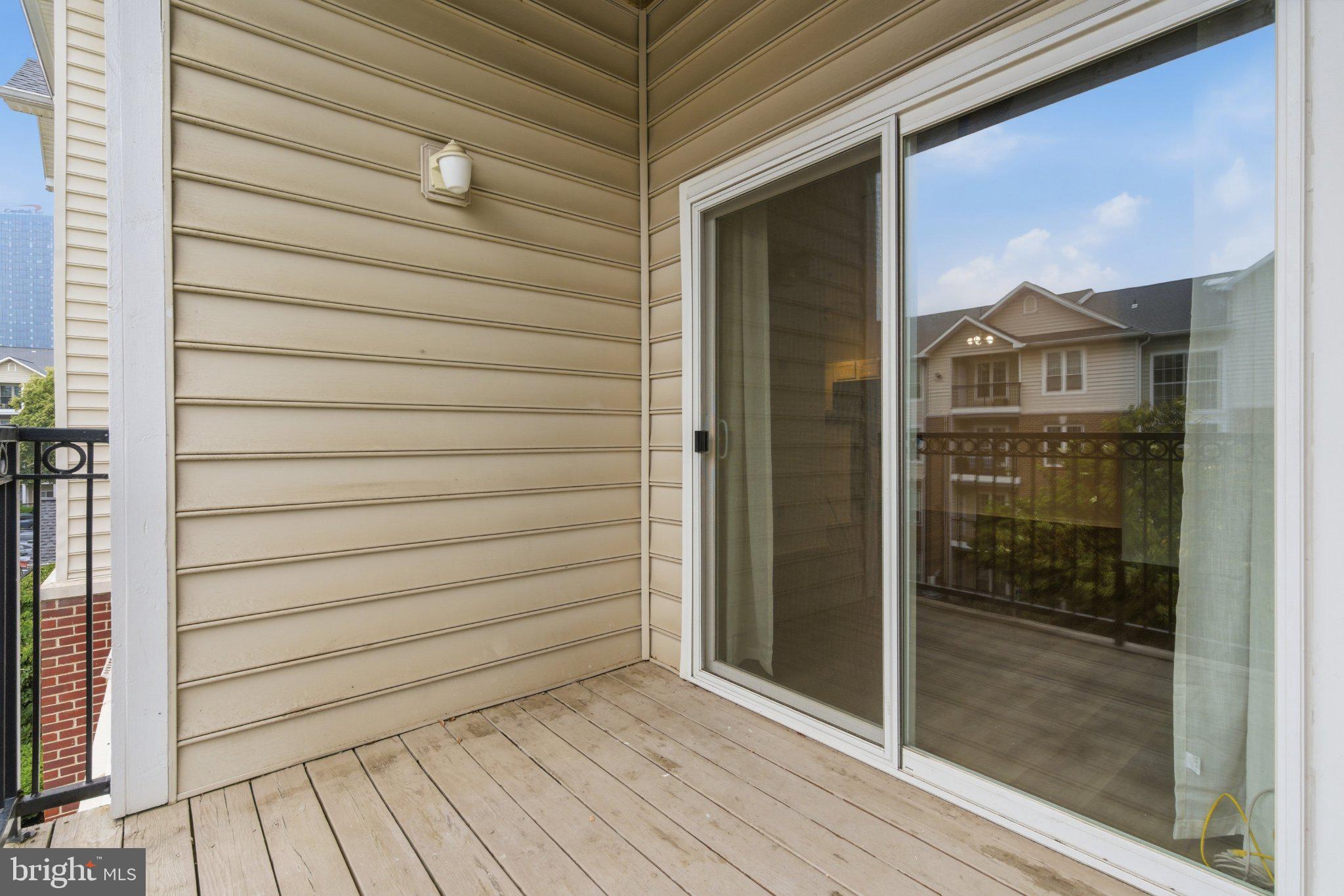 1580 Spring Gate Dr., Unit 4303 McLean, VA 22102 - Photo 24 of 41 Sunny balcony with serene views.