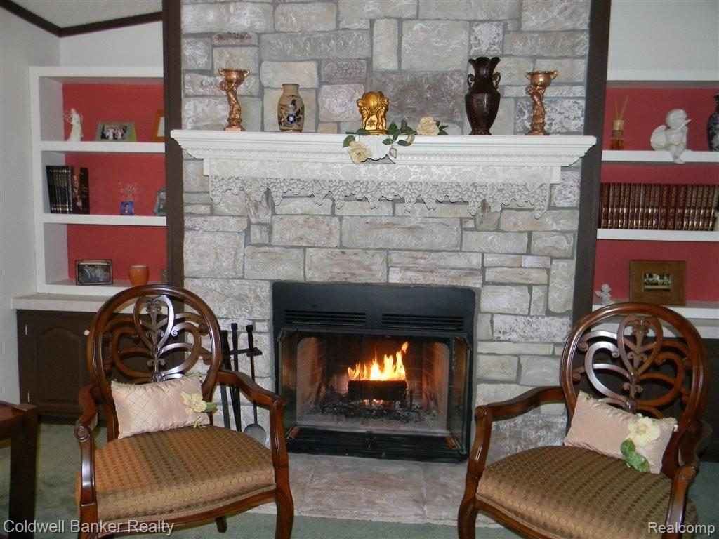 6991 Fish Lake Road Holly, MI 48442 - Photo 6 of 24 Cozy Fireplace