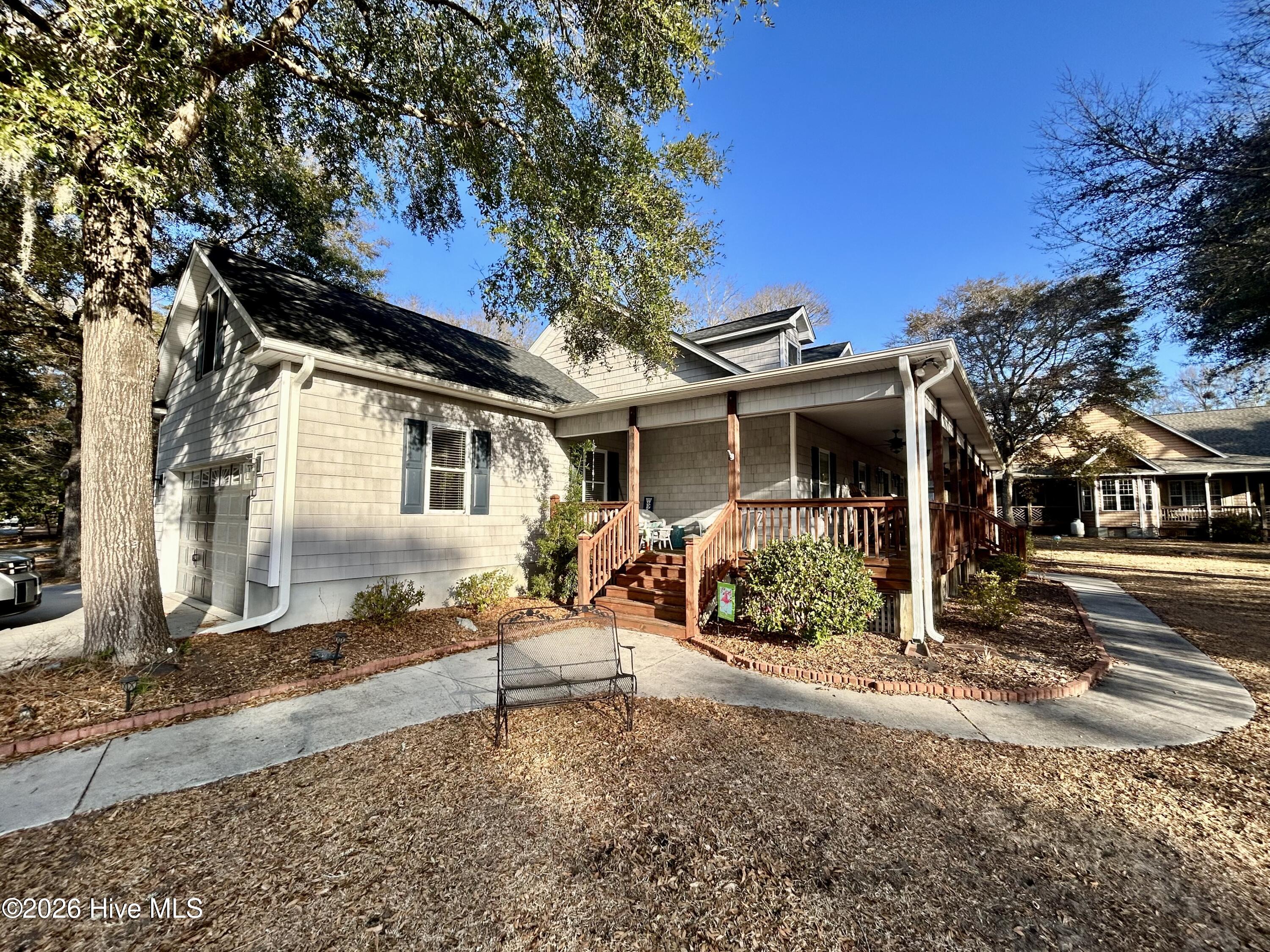 208 Shoreline Drive Cedar Point, NC 28584 - Photo 3 of 12 Additional porch entrance