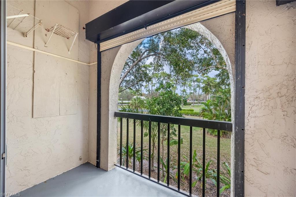 940 Augusta Boulevard, Unit D939 Naples, FL 34113 - Photo 21 of 42 a view of a room with a large window