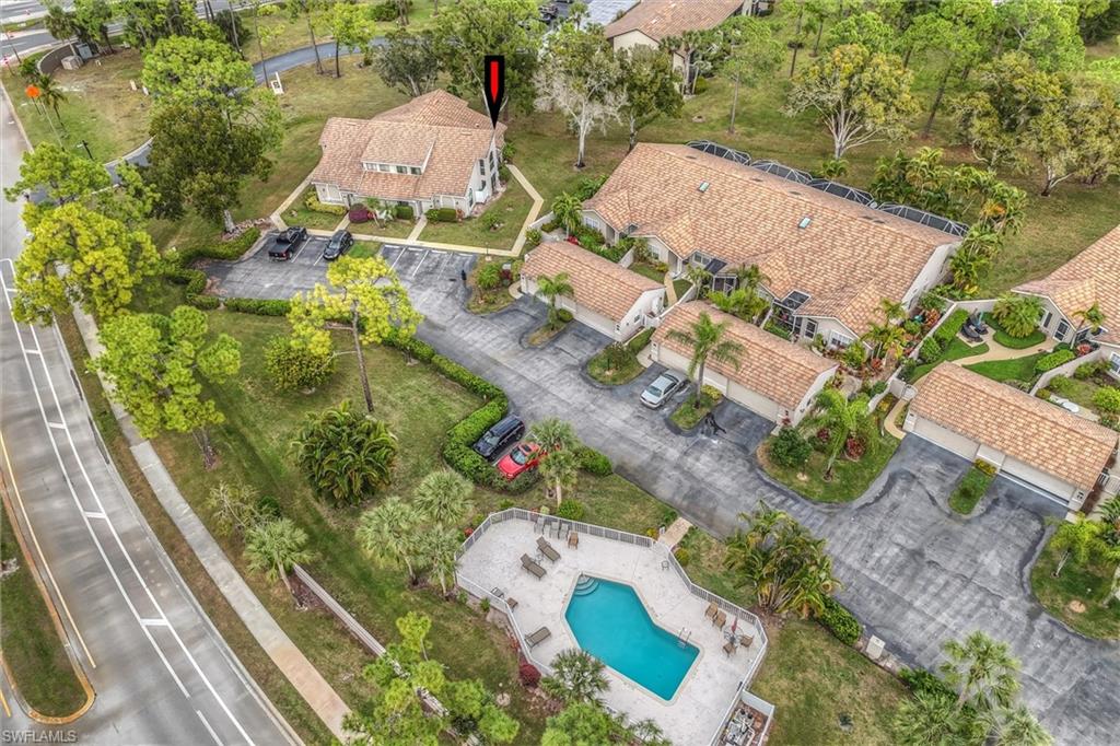 940 Augusta Boulevard, Unit D939 Naples, FL 34113 - Photo 42 of 42 an aerial view of a house