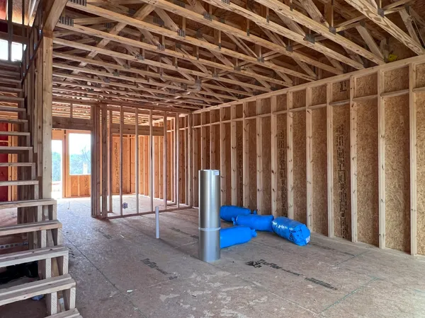 a view of a room with wooden walls