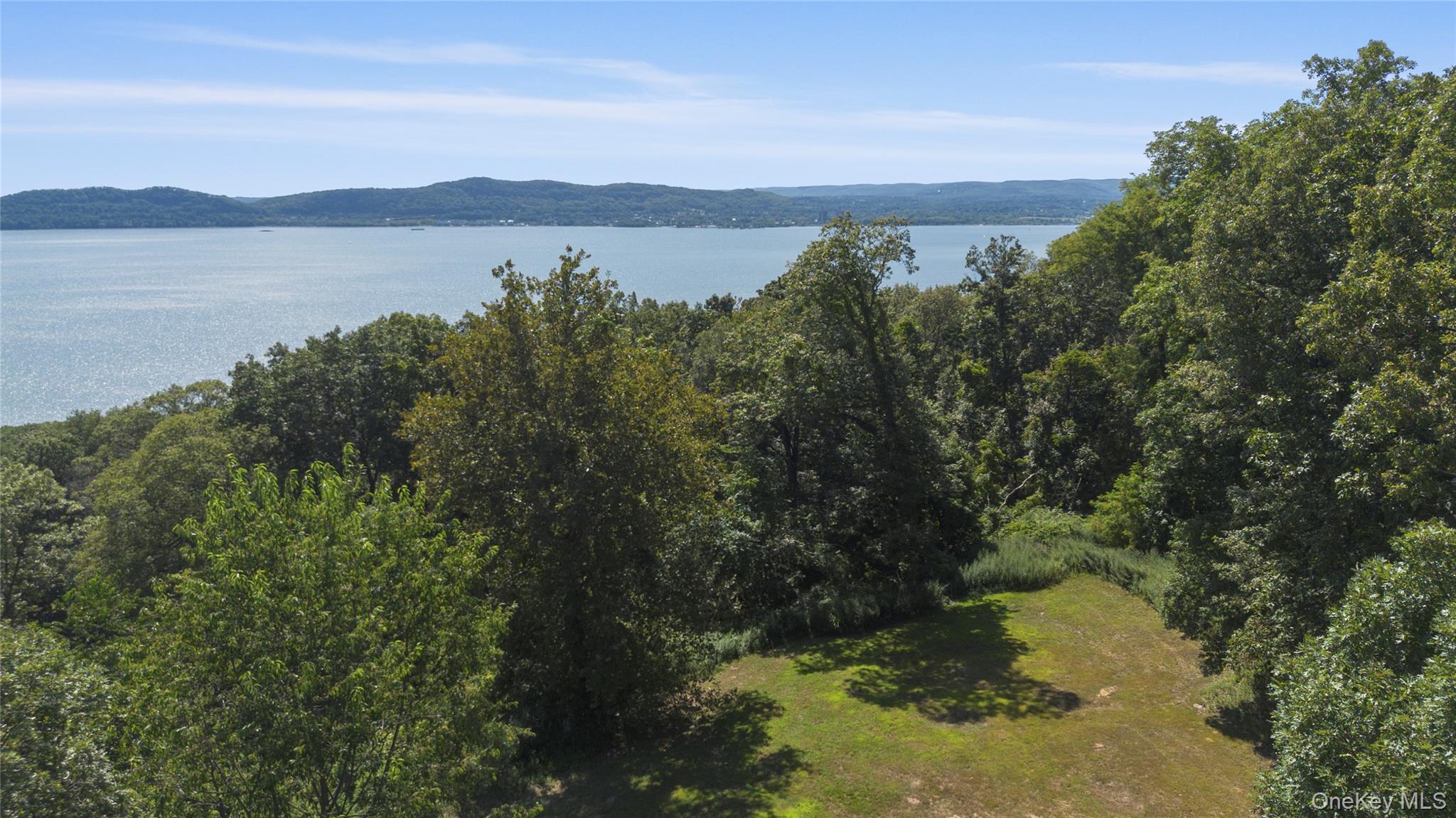 3 Prickly Pear Hill Road Croton-on-Hudson, NY 10520 - Photo 6 of 16 a view of lake with green landscape