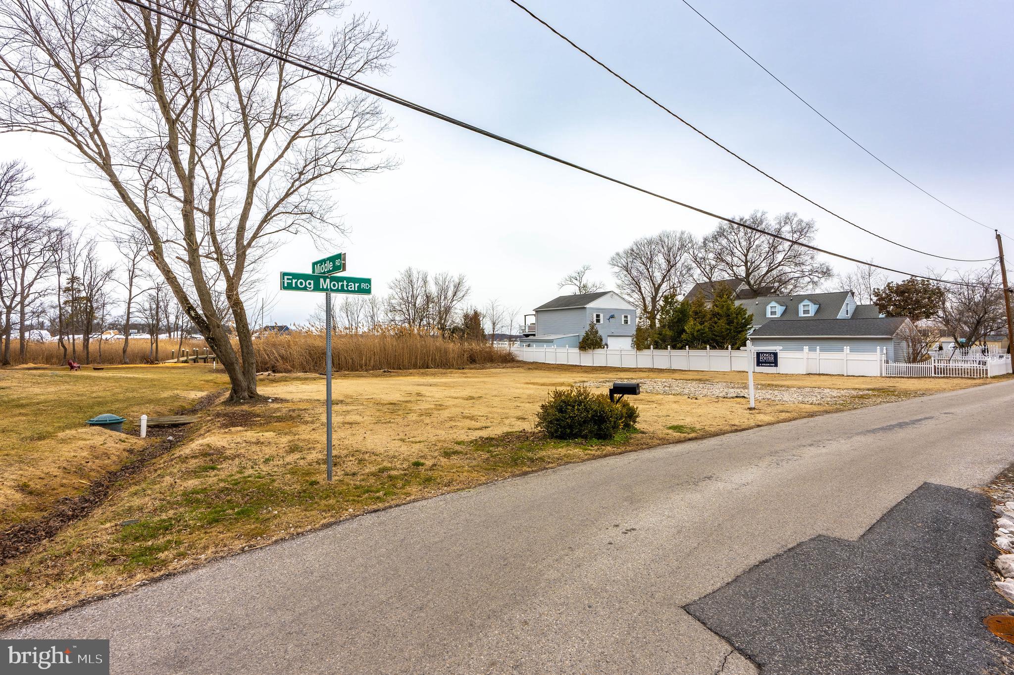 Frog Mortar Road Middle River, MD 21220 - Photo 9 of 15 a view of a swimming pool with a yard