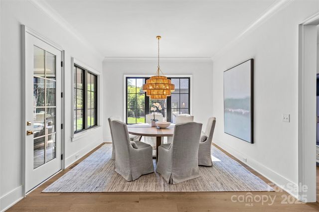 a dining room with furniture window wooden floor