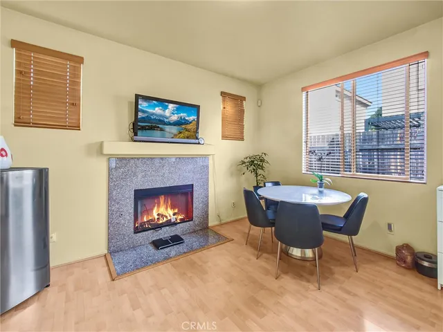 a view of a livingroom with furniture and a fireplace