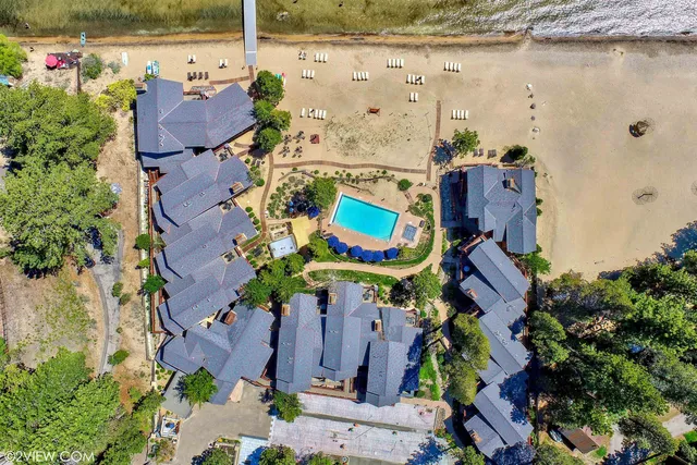 an aerial view of houses and outdoor space